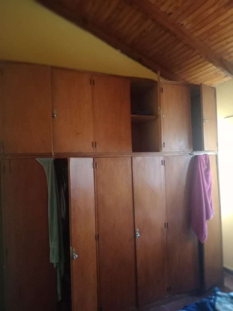 Casa y terreno con título en venta - Imagen 5