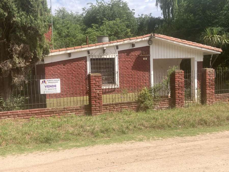 SE VENDE CASA A REFACCIONAR MAS 4 TERRENOS CON SALIDA AL ARROYO EN TANTI - Imagen 2